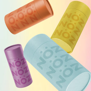 Colored sunscreen sticks floating in the air that is safe for your nose